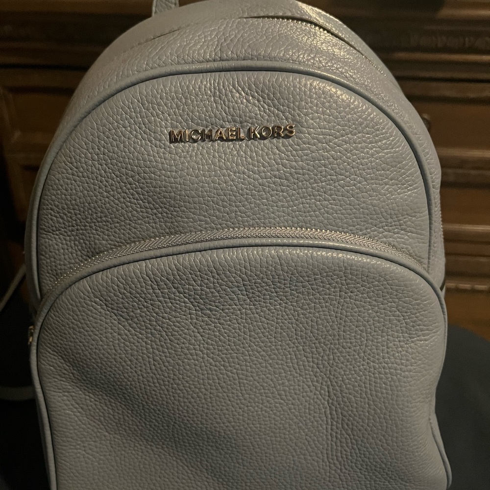 Michael Kors backpack purse medium size baby blue only carried a few times.